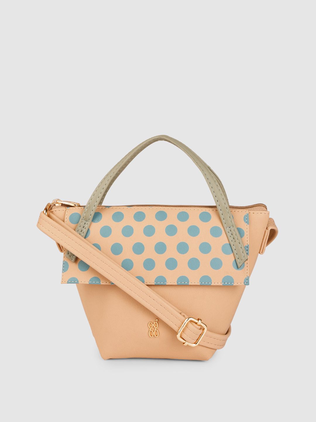 Baggit Beige & Blue Solid Regular Structured Handheld Bag with Polka Dots Print Applique Price in India