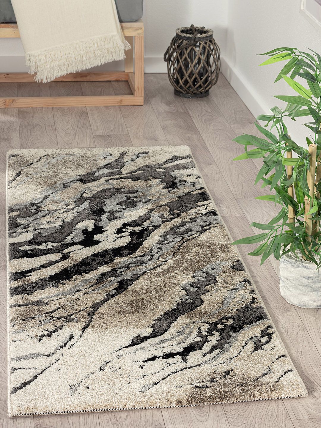 OBSESSIONS Beige & Black Abstract Textured Anti Slip Floor Runner Price in India