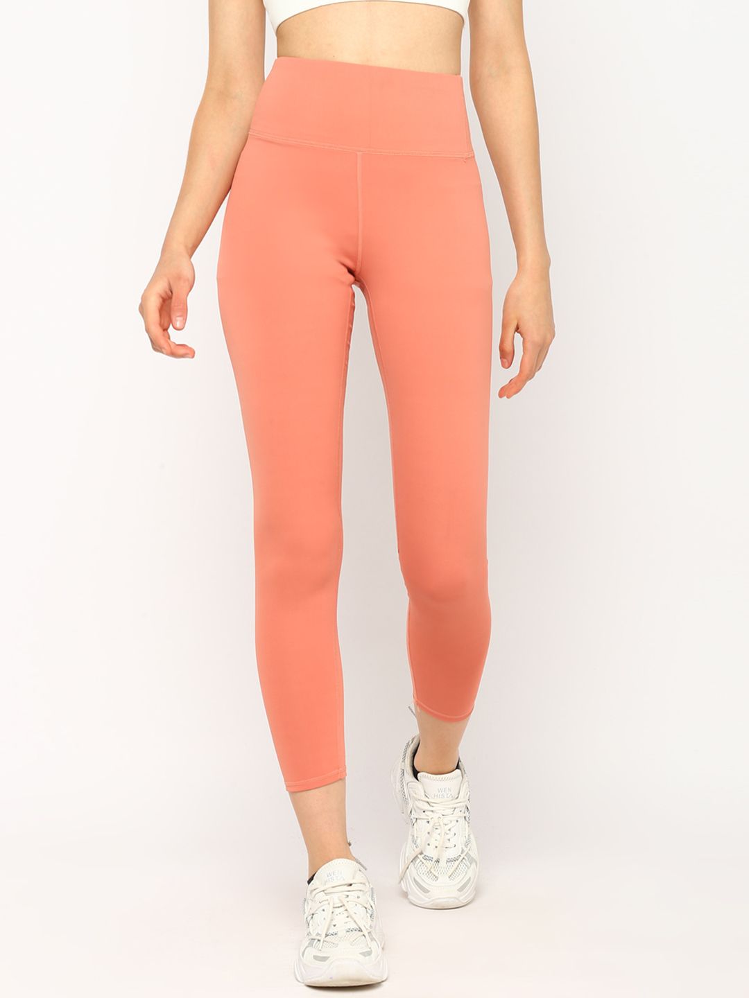 JerfSports Women Peach-Colored Solid Tights Price in India