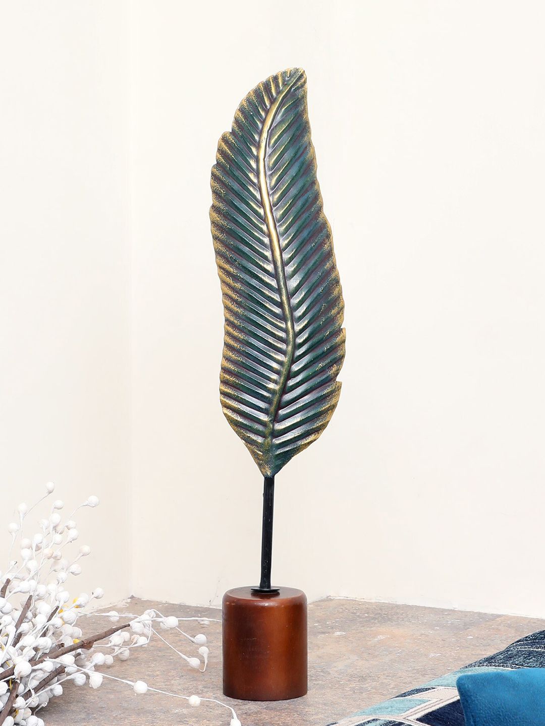 vedas Metallic-Toned & Blue Textured T-Laika Leaf Showpiece Price in India