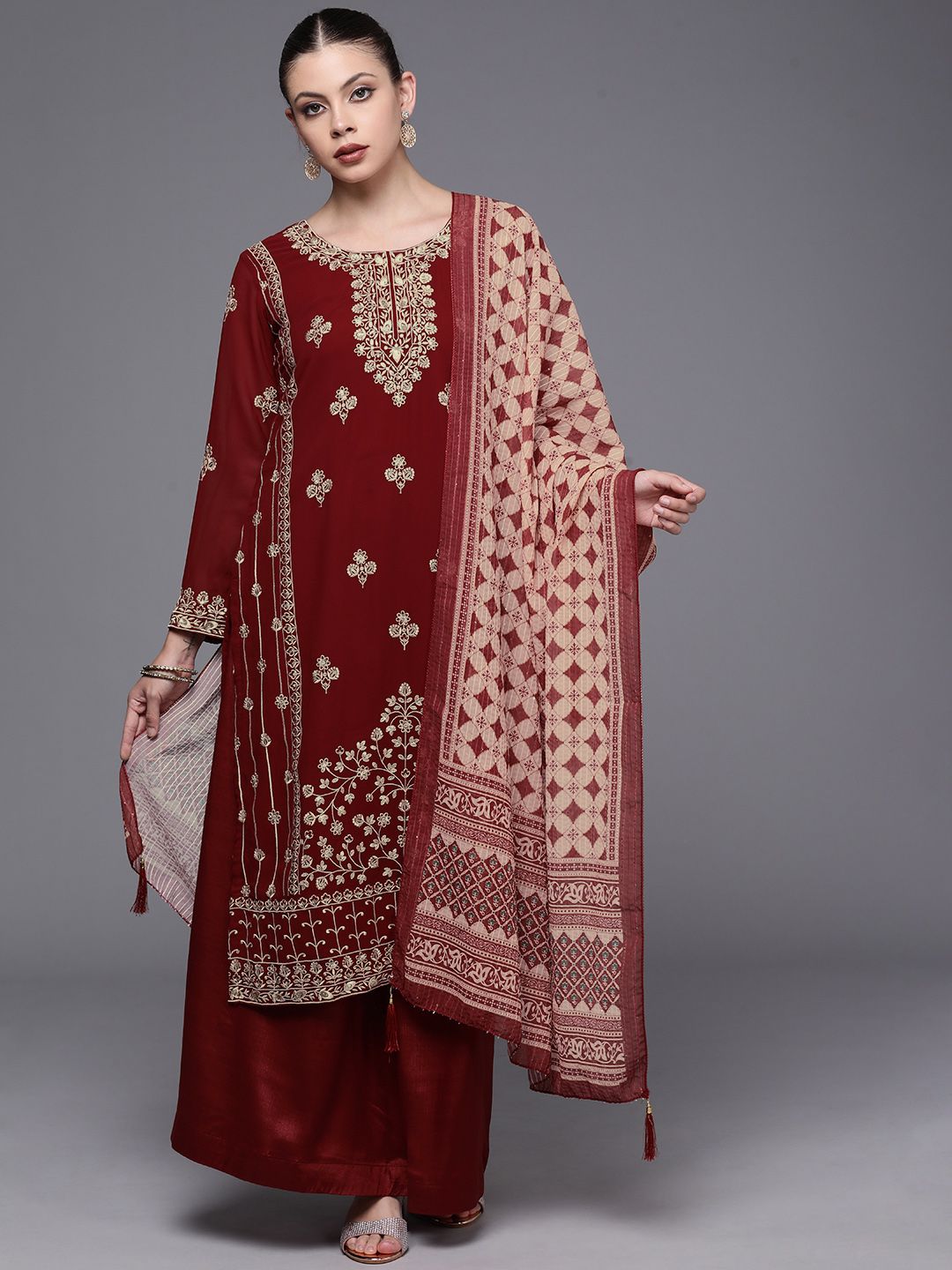 Mitera Maroon & Golden Embroidered Unstitched Dress Material Price in India