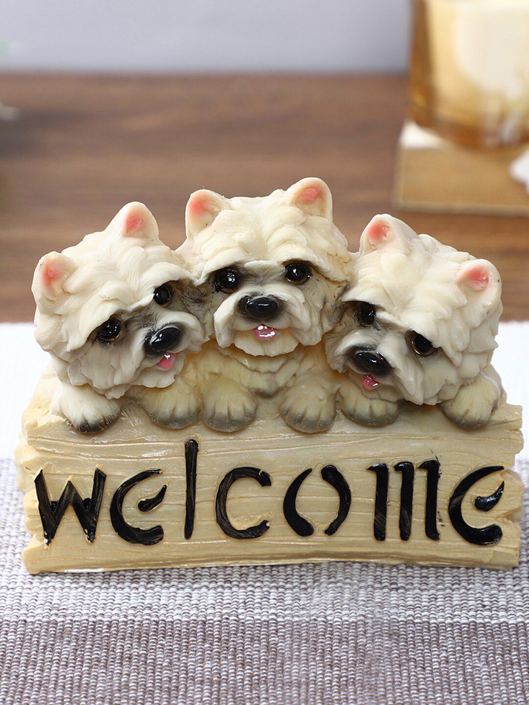 TIED RIBBONS Beige & Pink Welcome Plate with Dog Statue Showpiece Price in India