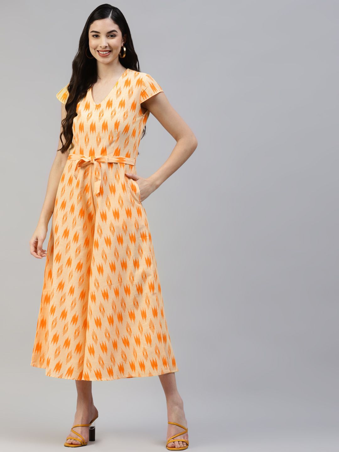 Poshak Hub Women Yellow & Orange Pure Cotton Ikat Print Basic Jumpsuit Price in India