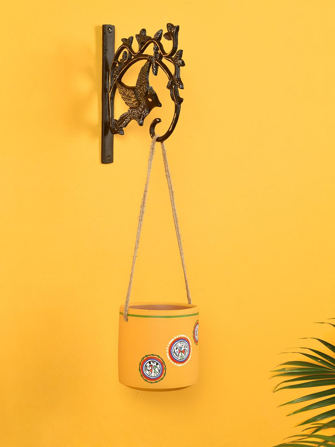AAKRITI ART CREATIONS Yellow Warli Terracotta Hanging Planter with Metal Stand Price in India
