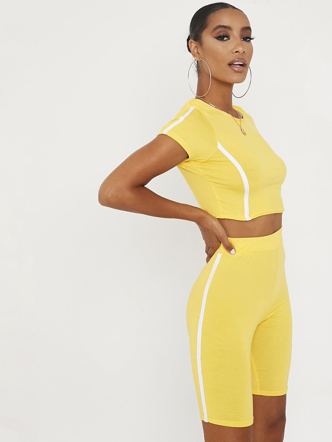 I Saw It First Women Yellow Solid Cycling Tracksuit Price in India