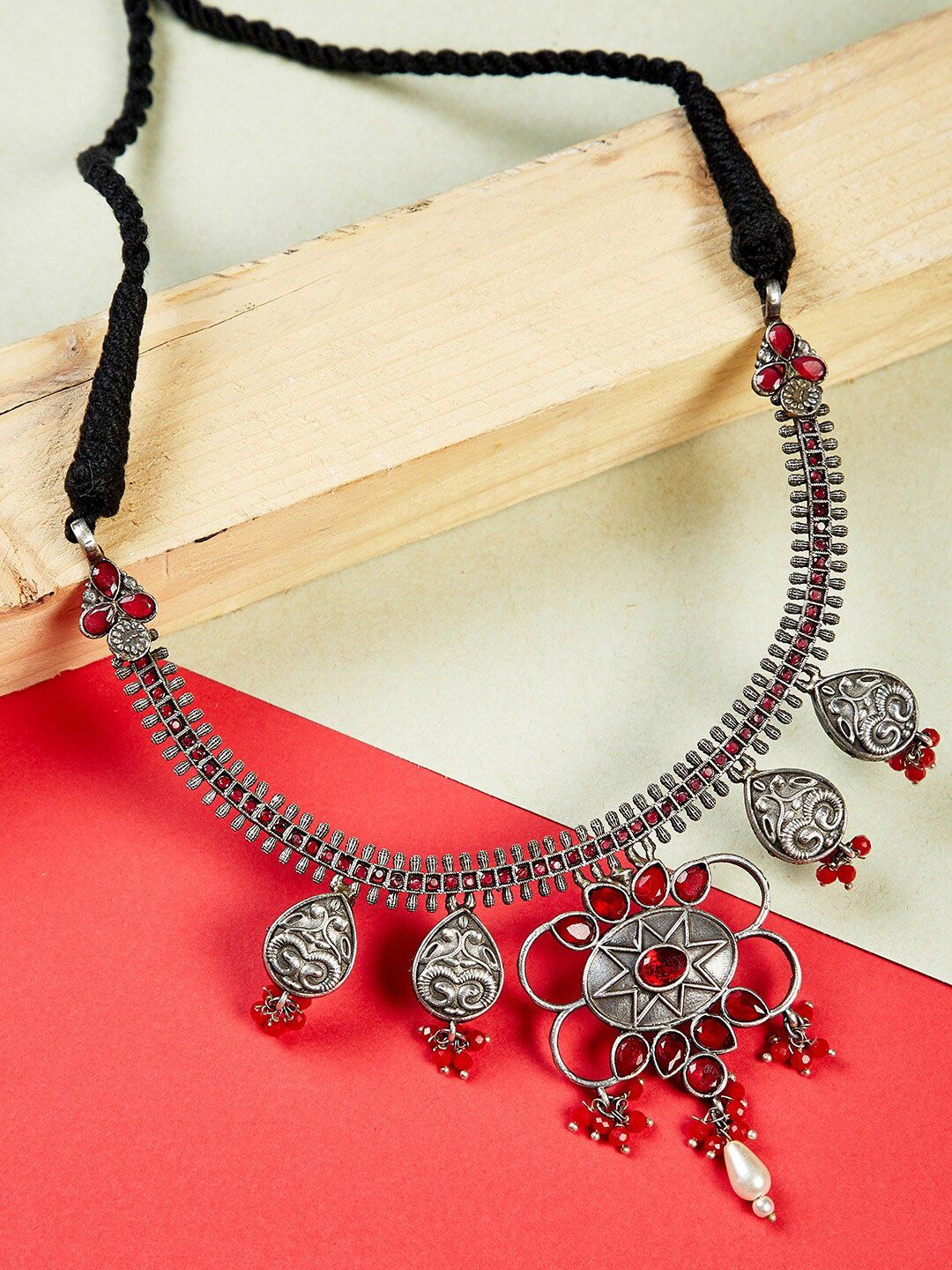 ZeroKaata Silver-Toned & Red Brass Silver-Plated Oxidised Necklace Price in India