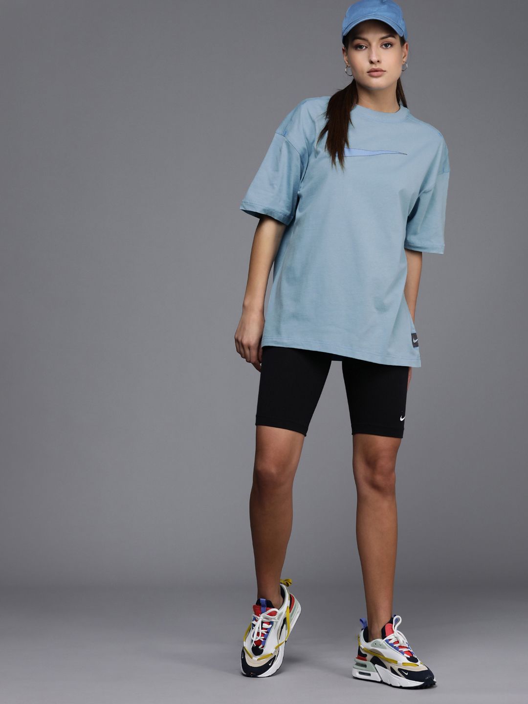 Nike Women Blue Solid Pure Cotton Swoosh Extended Sleeves Oversized T-Shirt Price in India