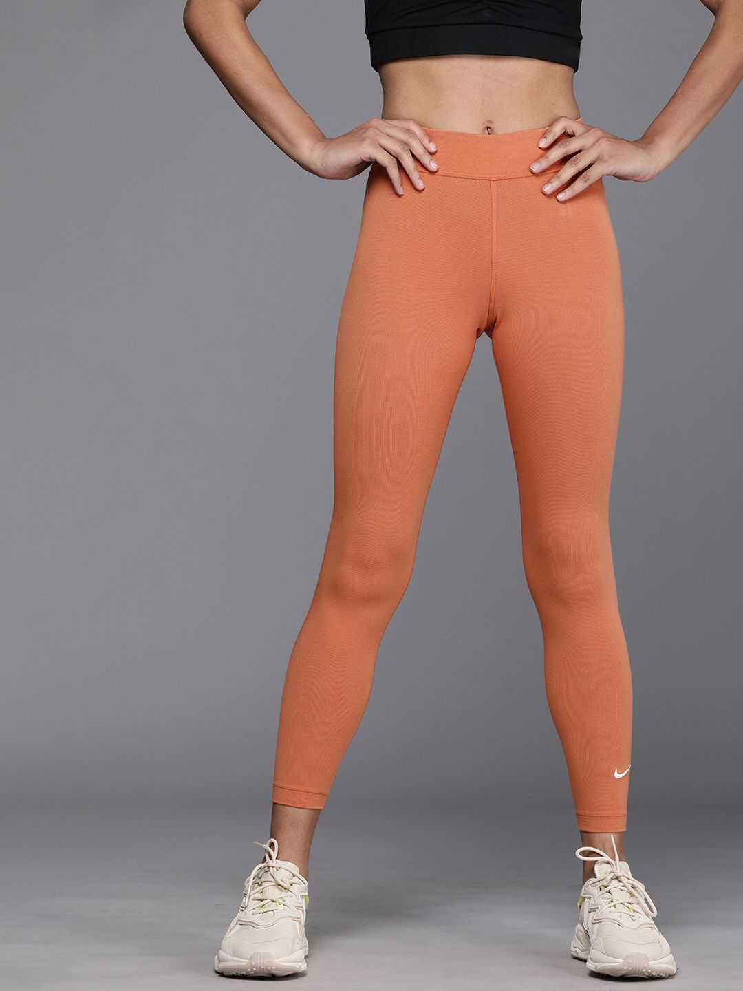 Nike Women Orange Sportswear Essential Tights with Printed Detail Price in India