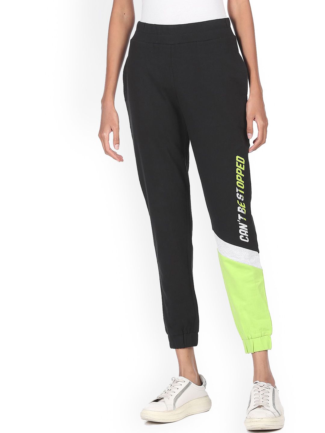 Sugr Women Black & Lime Green Colourblocked Mid Rise Cropped Active Joggers Price in India