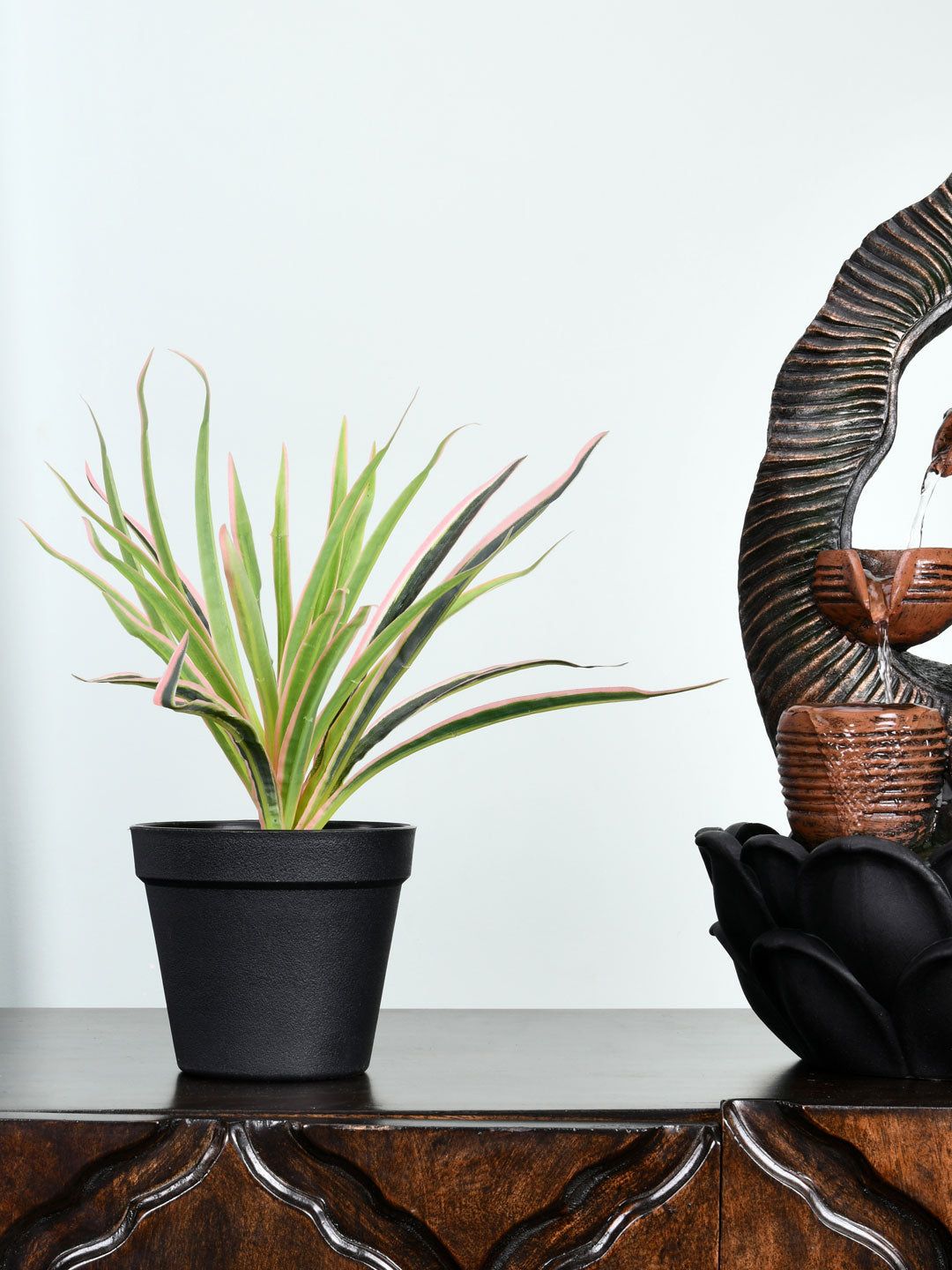 Athome by Nilkamal Black & Green Artificial Snake Potted Plant Price in India