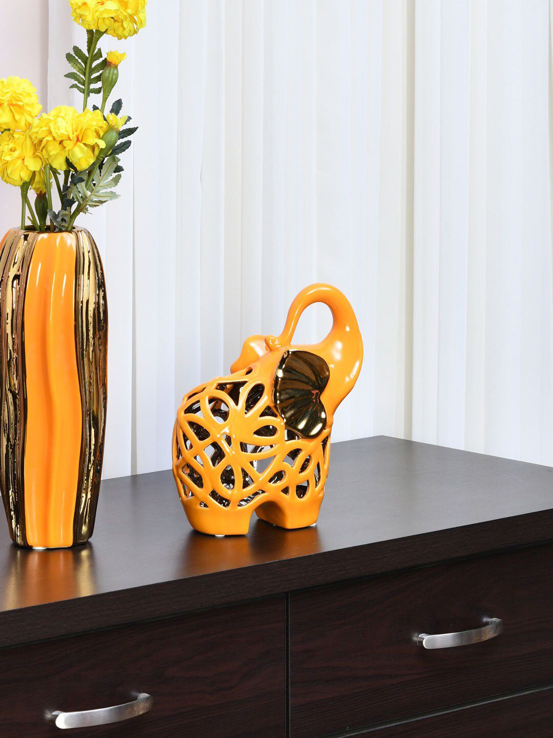 Athome by Nilkamal Mustard Yellow & Gold-Toned Elephant Cutwork Showpiece Price in India