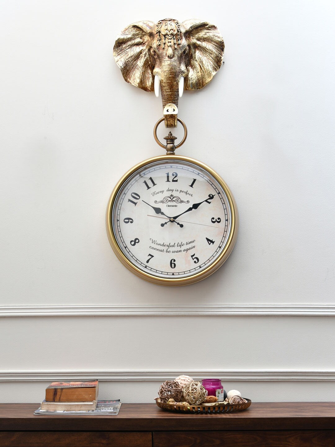 Athome by Nilkamal Gold-Toned & Black Printed Animal Shaped Elephant Holding Wall Clock Price in India