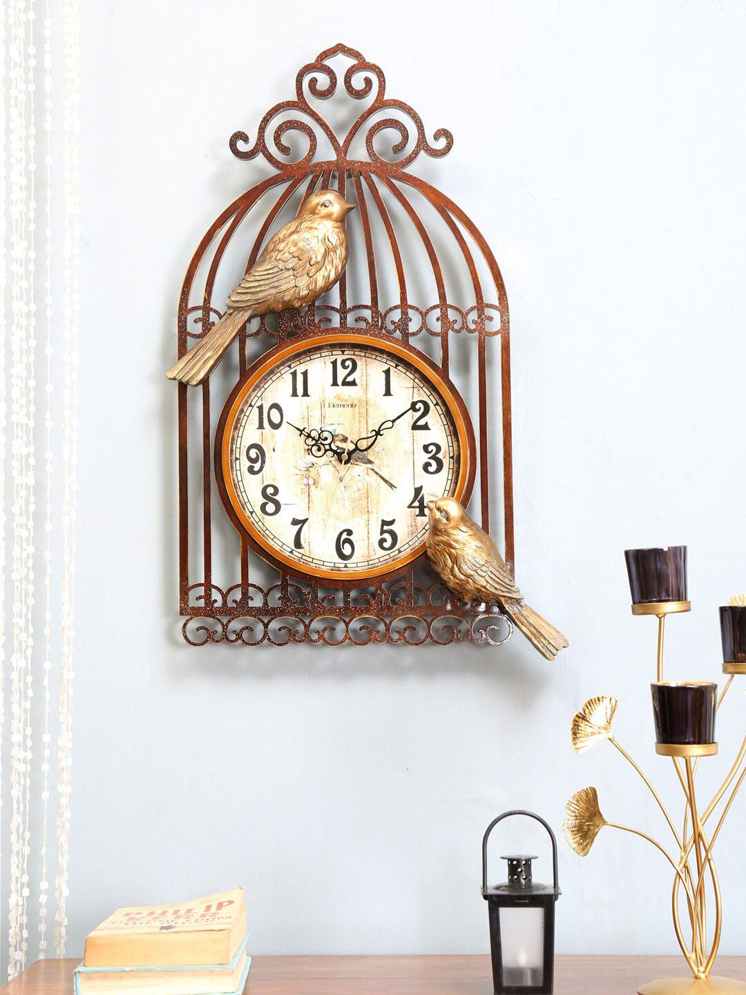 Athome by Nilkamal Gold-Toned & Cream-Coloured Textured Bird Cage Contemporary Wall Clock Price in India