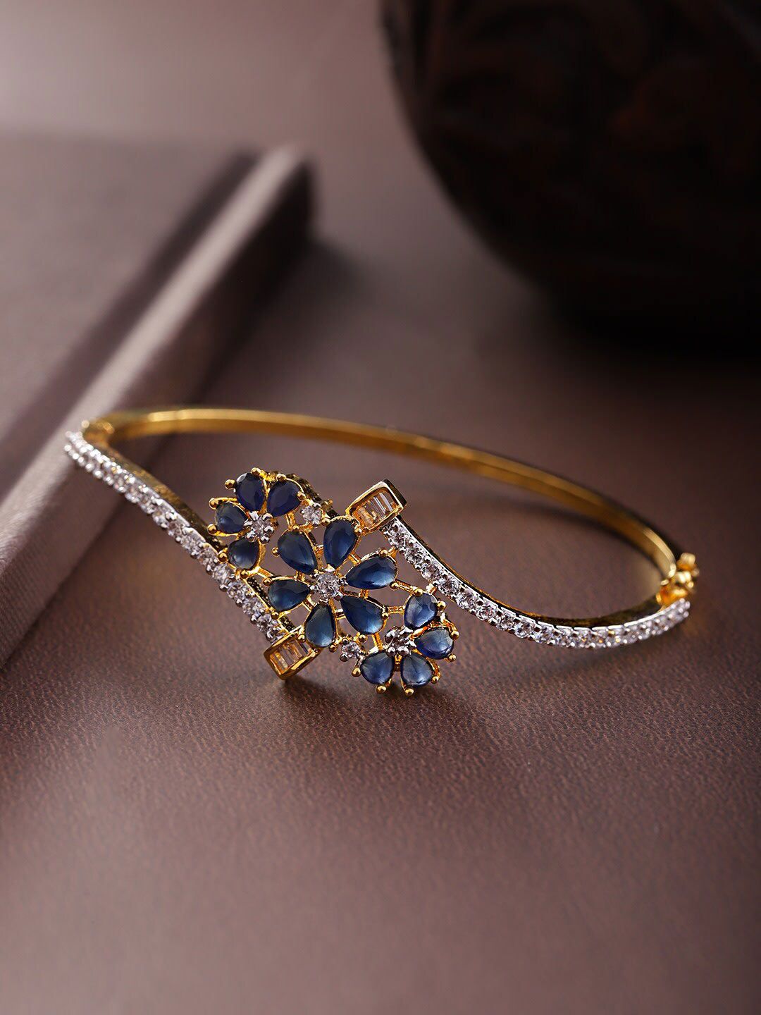 Priyaasi Women Gold-Toned & Blue Brass American Diamond Gold-Plated Bangle-Style Bracelet Price in India