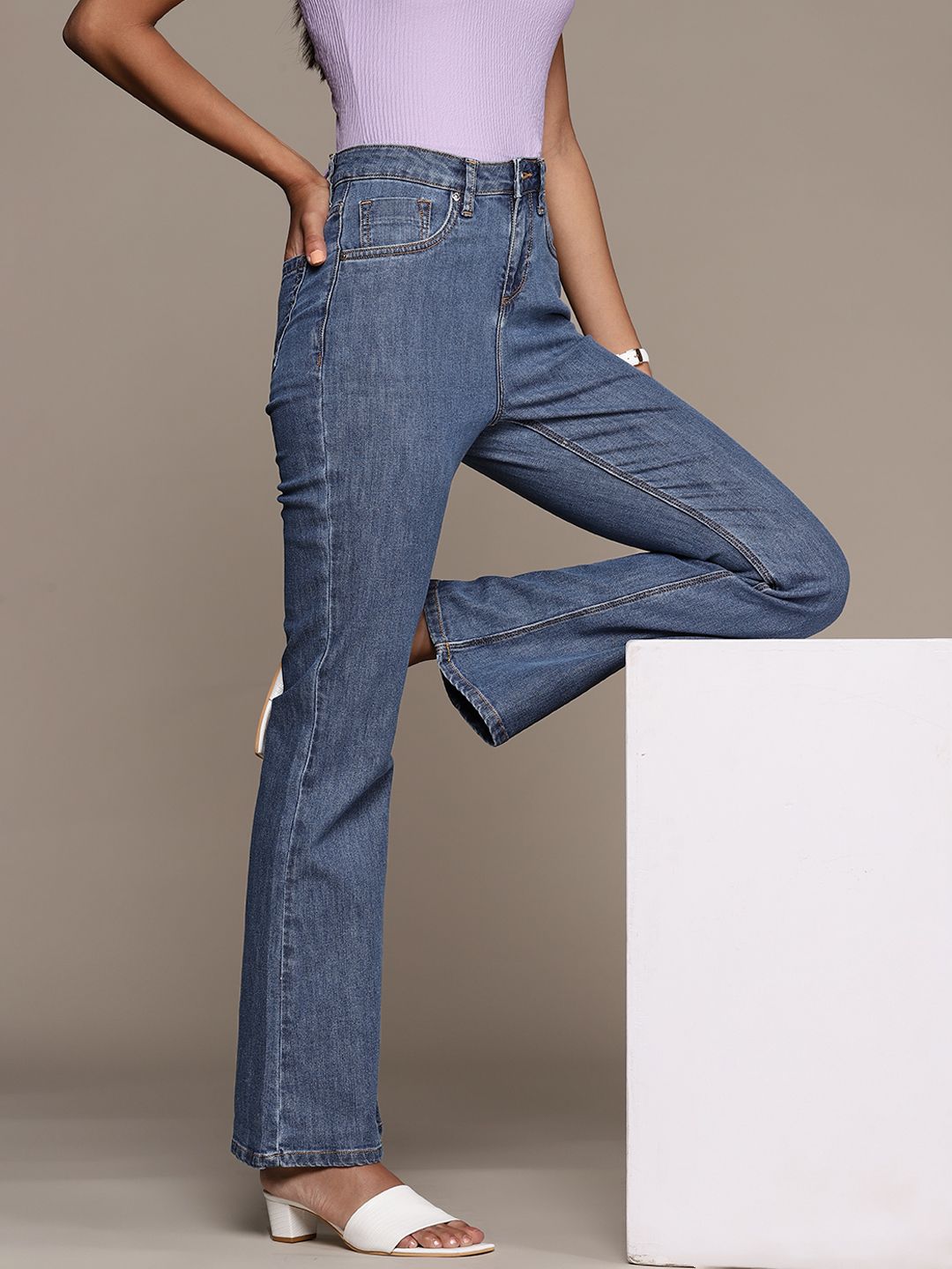 bebe Women Blue Bootcut Light Fade Stretchable Jeans Price in India