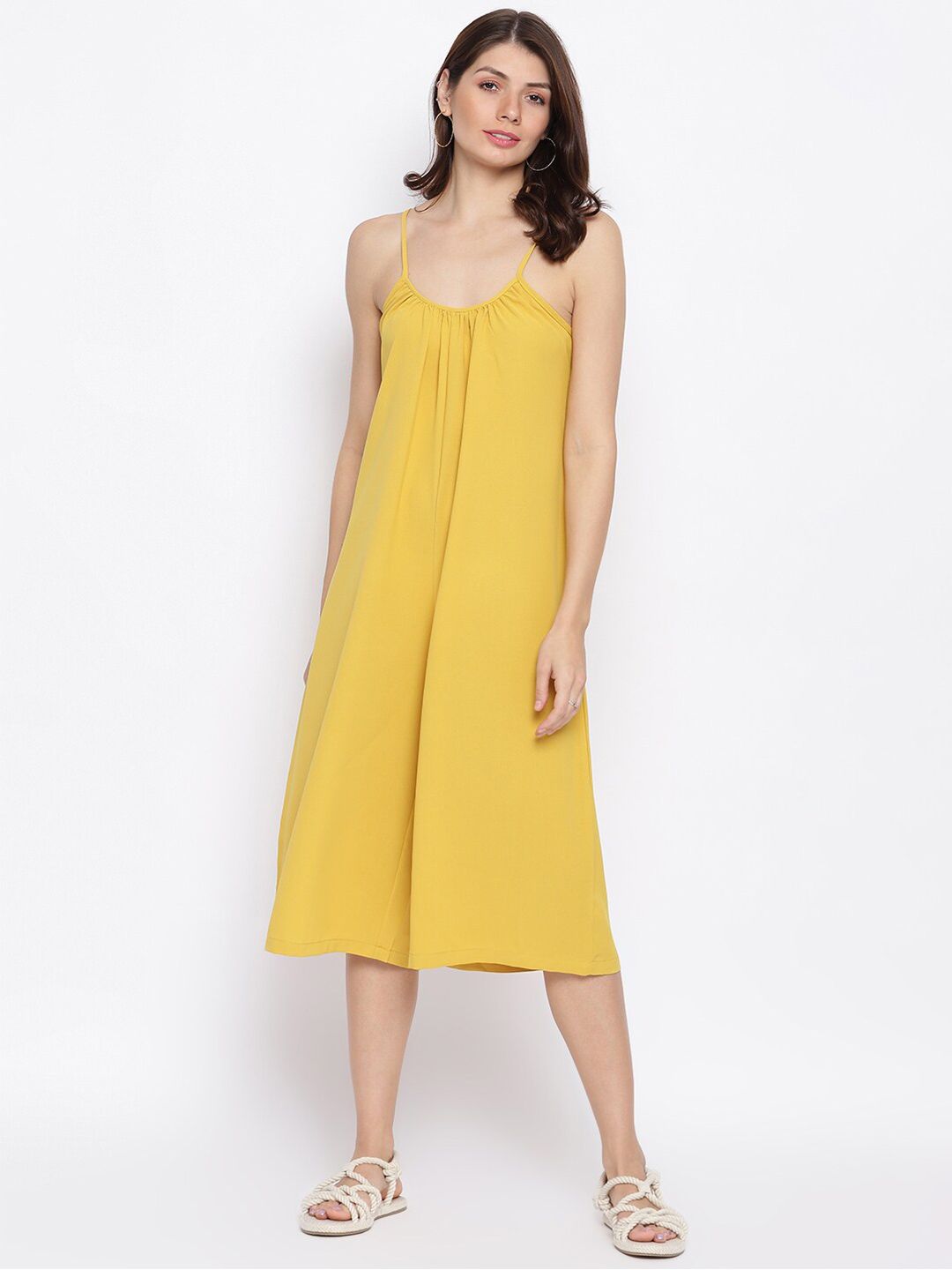 iki chic Women Mustard Yellow Solid Culotte Jumpsuit Price in India