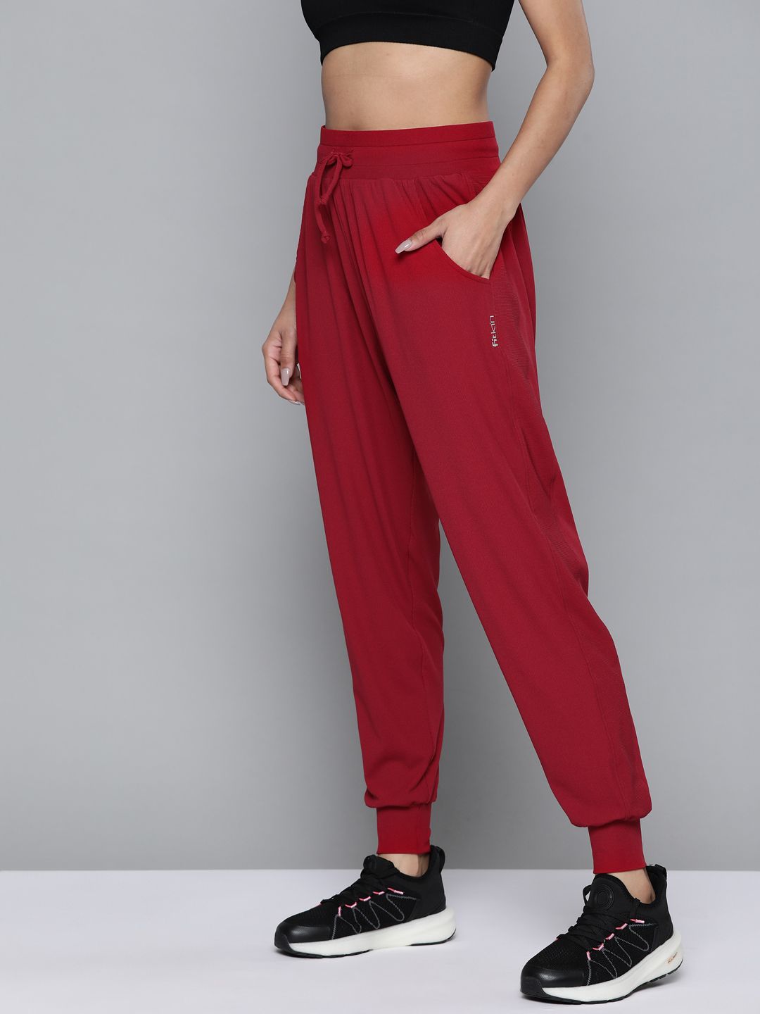Fitkin Women Maroon Solid Relaxed Fit Dry Fit Gym Joggers Price in India
