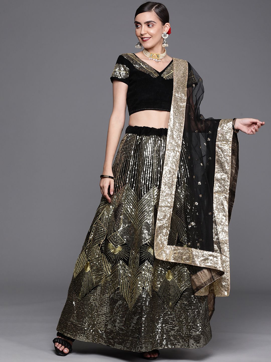 Mitera Women Black & Golden Embroidered Sequinned Unstitched Lehenga with Blouse & Dupatta Price in India