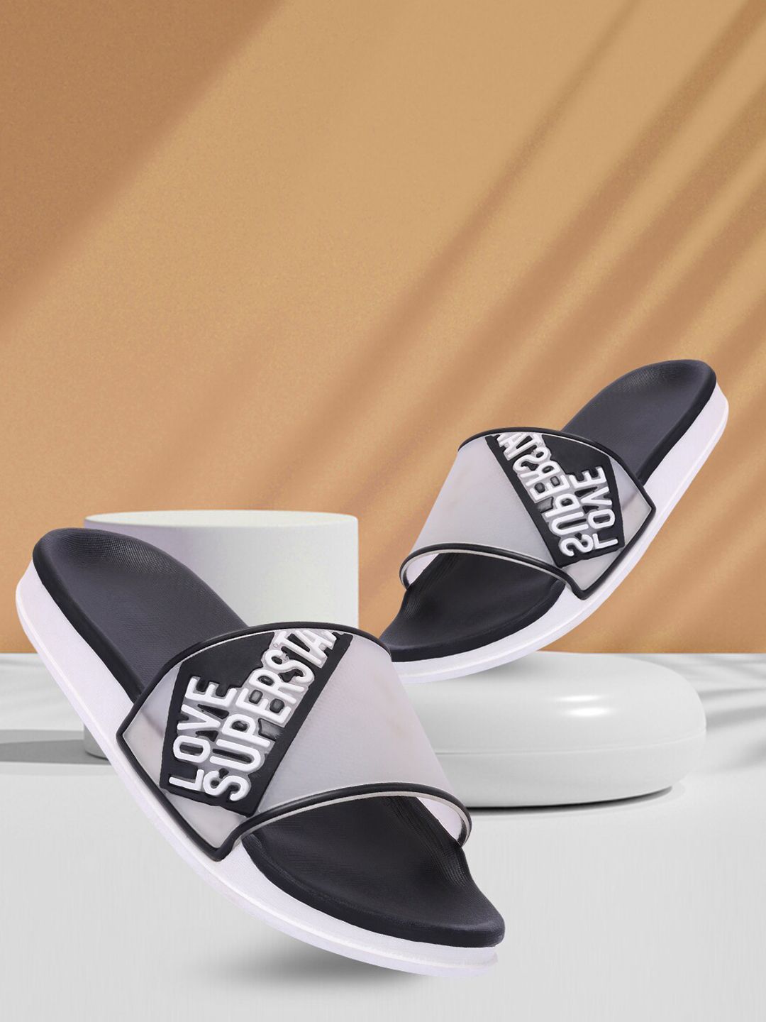 Longwalk Women Black & White Printed Sliders Price in India