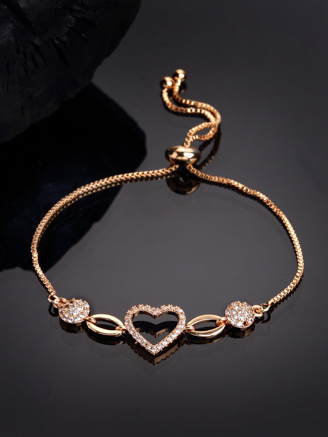 NEUDIS Women Gold-Toned Stone Studded Charm Bracelet Price in India