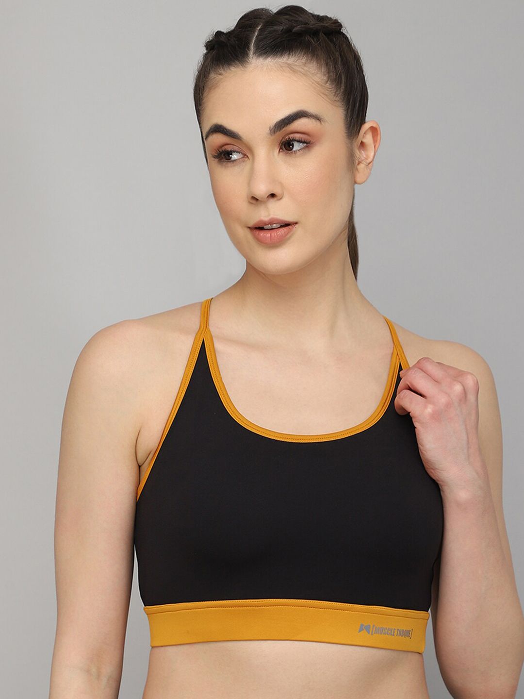 MUSCLE TORQUE Black & Mustard Styled Back Sports Bra Price in India