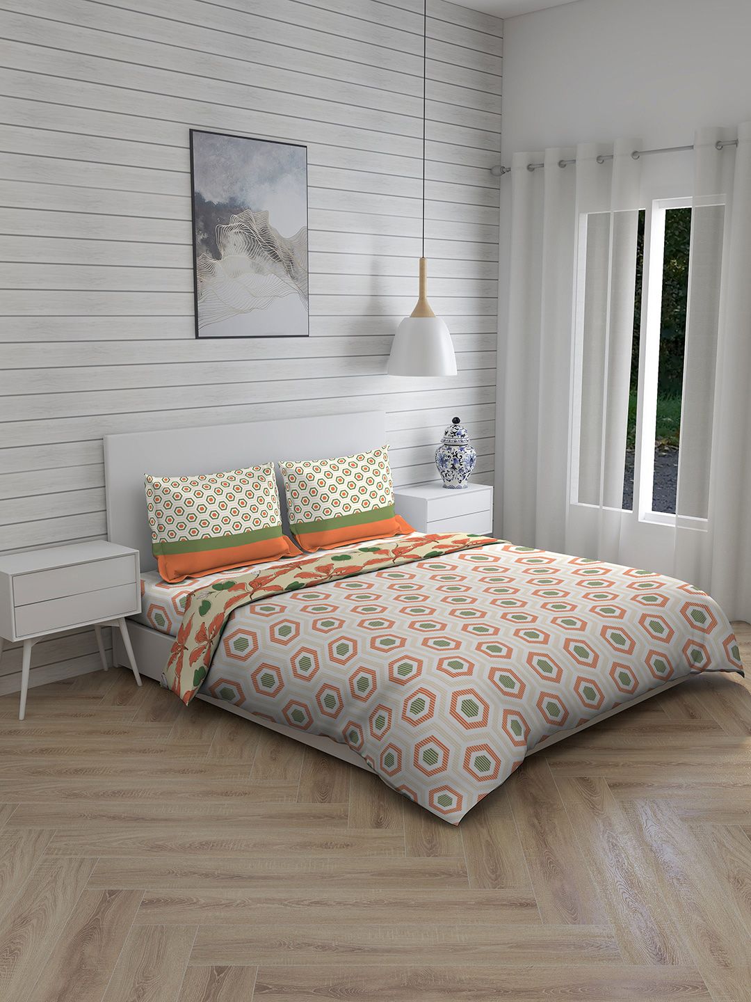 Layers Orange Printed Double Queen Bedsheet With 2 Pillow Covers & Comforter Price in India