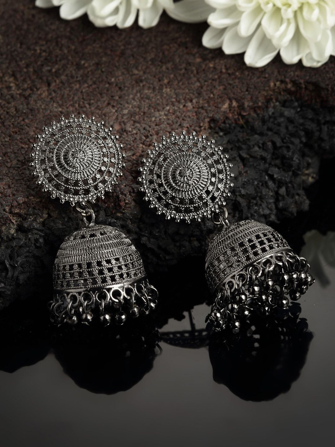 PANASH Silver-Toned Dome Shaped Oxidized Jhumka Earrings Price in India