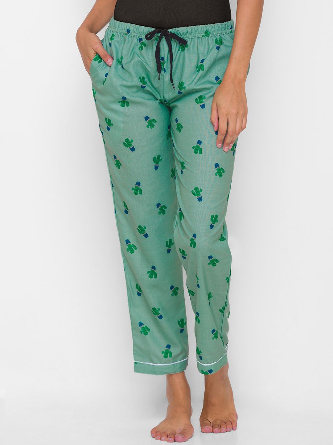 NOIRA Women Green Printed Mid-Rise Cotton Lounge Pants Price in India