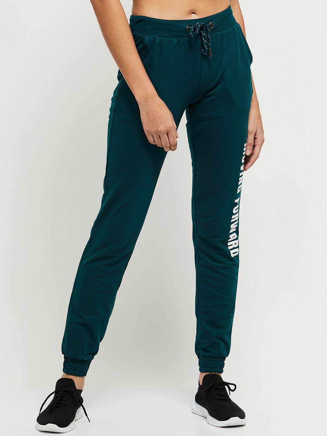 max Women Green Solid Track Pants Price in India