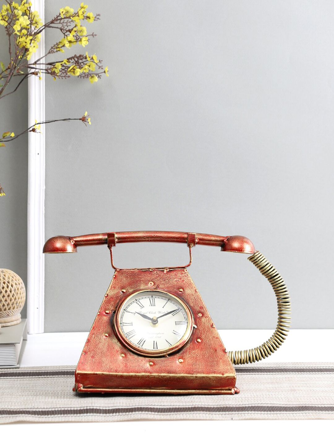 Aapno Rajasthan Rust & Gold-Toned Telephone Shaped 19 CM Traditional Analogue Table Clock Price in India