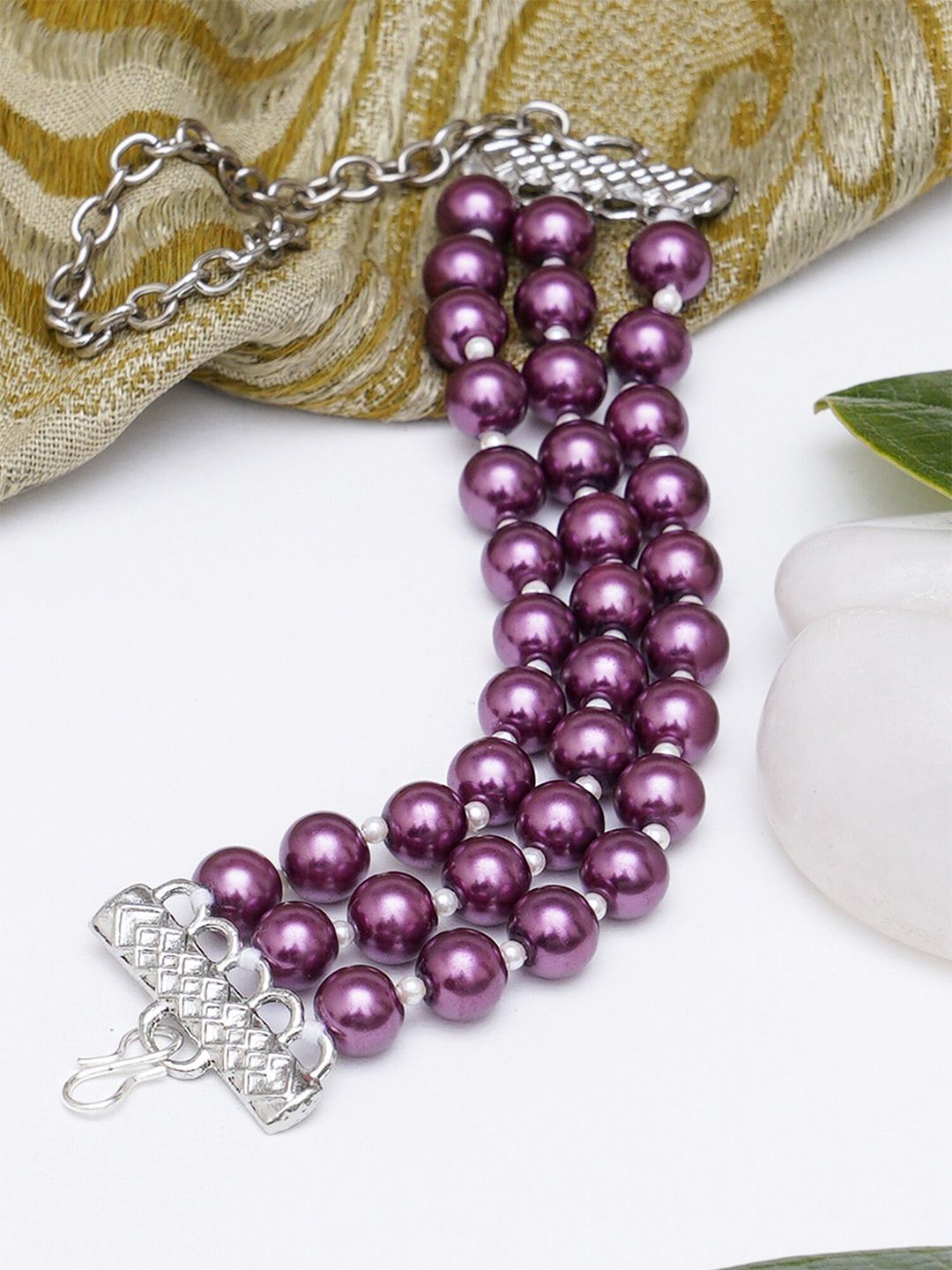 KARATCART Women Purple & Silver-Toned Beaded Kundan Multistrand Bracelet Price in India