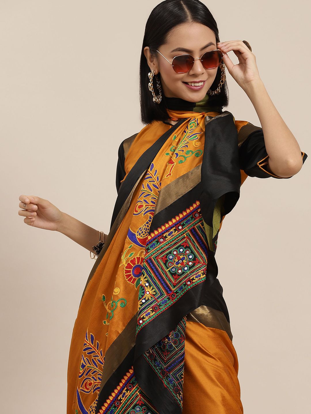 Mitera Mustard & Black Embellished Kutchi Embroidery Saree Price in India