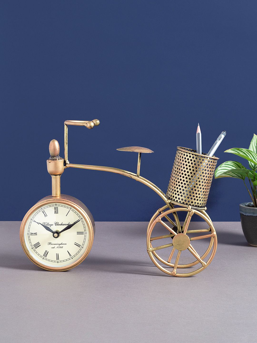 Golden Peacock Gold-Toned Cycle Design Penstand With Dial Clock Price in India
