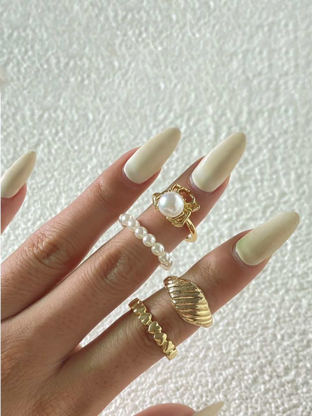 WHITE LIES Women Set Of 4 Gold-Plated White Beaded Finger Rings Price in India