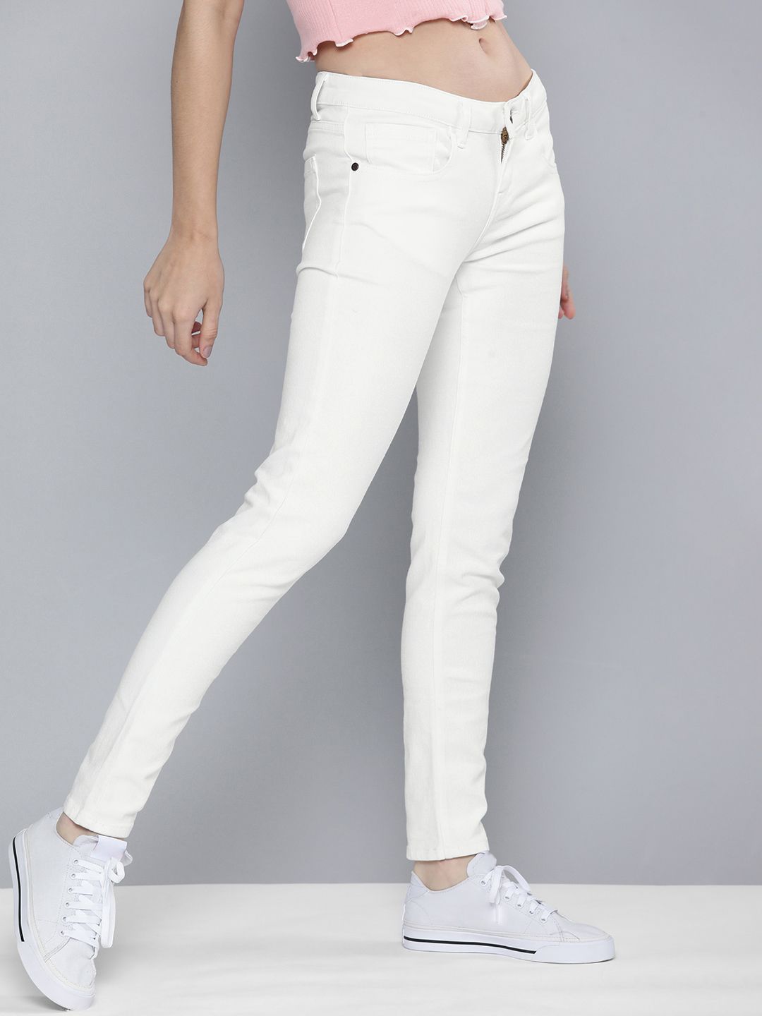 HERE&NOW Women White Skinny Fit Mid Rise Stretchable Jeans Price in India