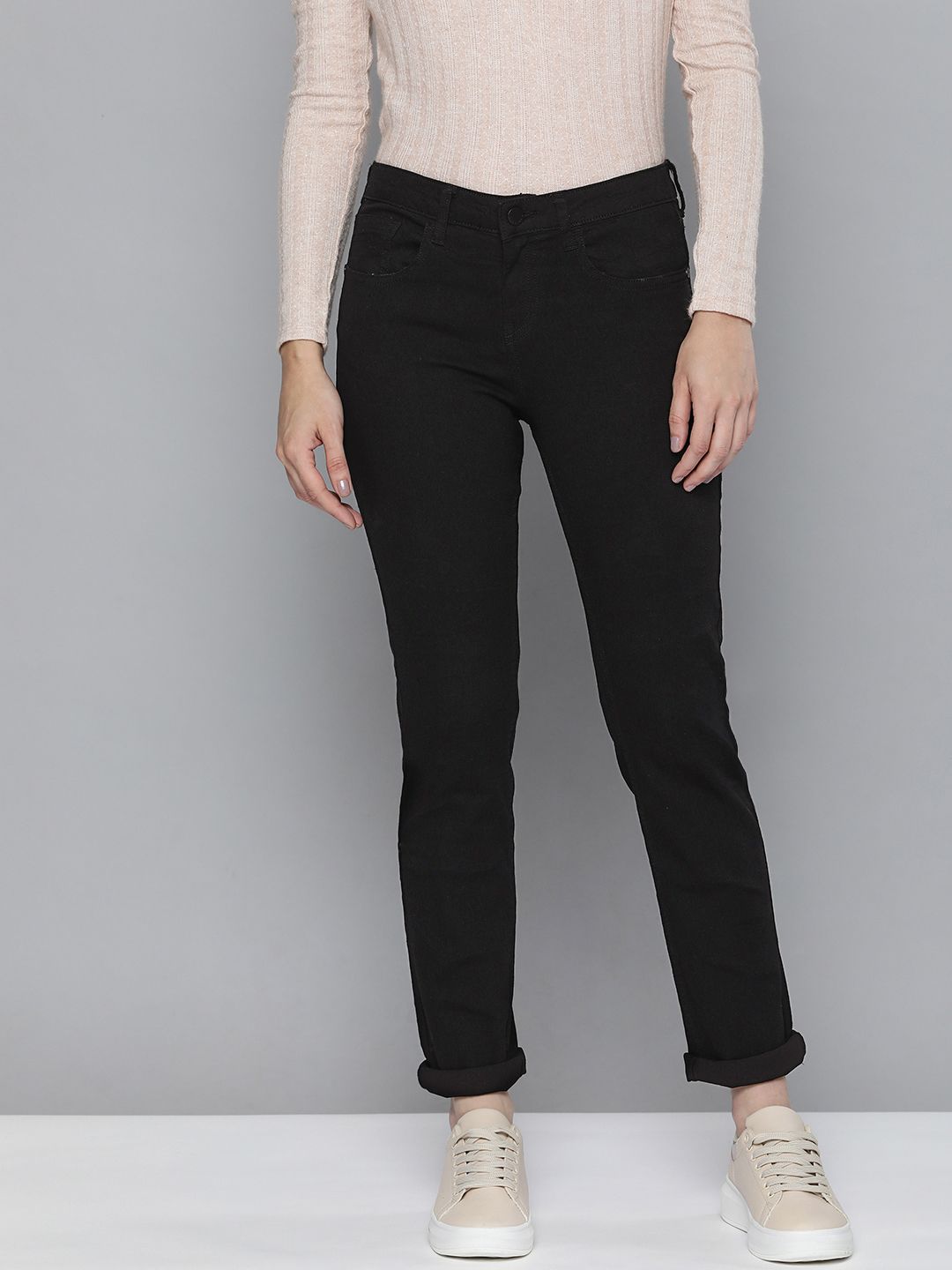 HERE&NOW Women Black Slim Fit Mid-Rise Clean Look Stretchable Jeans Price in India