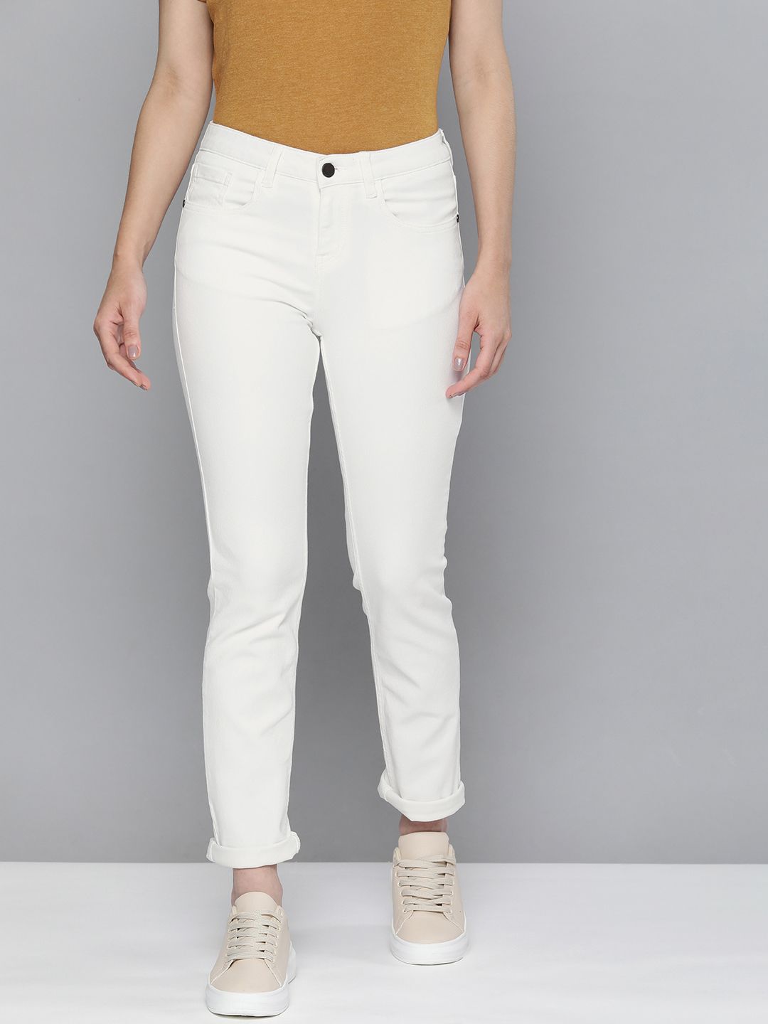 HERE&NOW Women White Slim Fit Mid-Rise Clean Look Stretchable Jeans Price in India