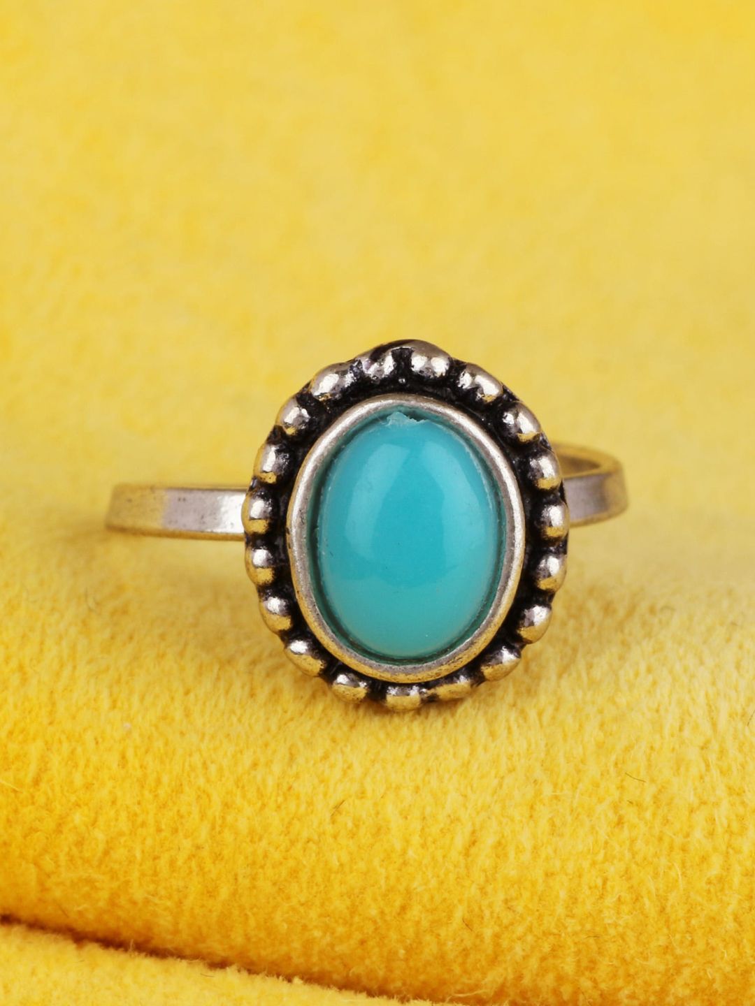 Silgo Women Oxidised Silver-Plated Turquoise Blue Turquoise Studded Adjustable Finger Ring Price in India