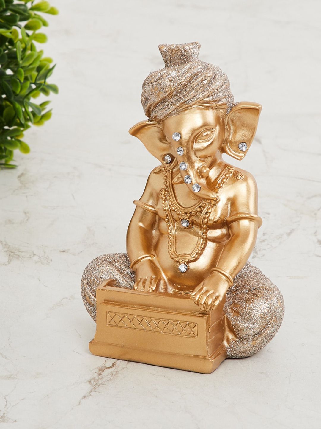 Home Centre Gold-Toned Polyresin Ganesha Musician Showpiece Price in India