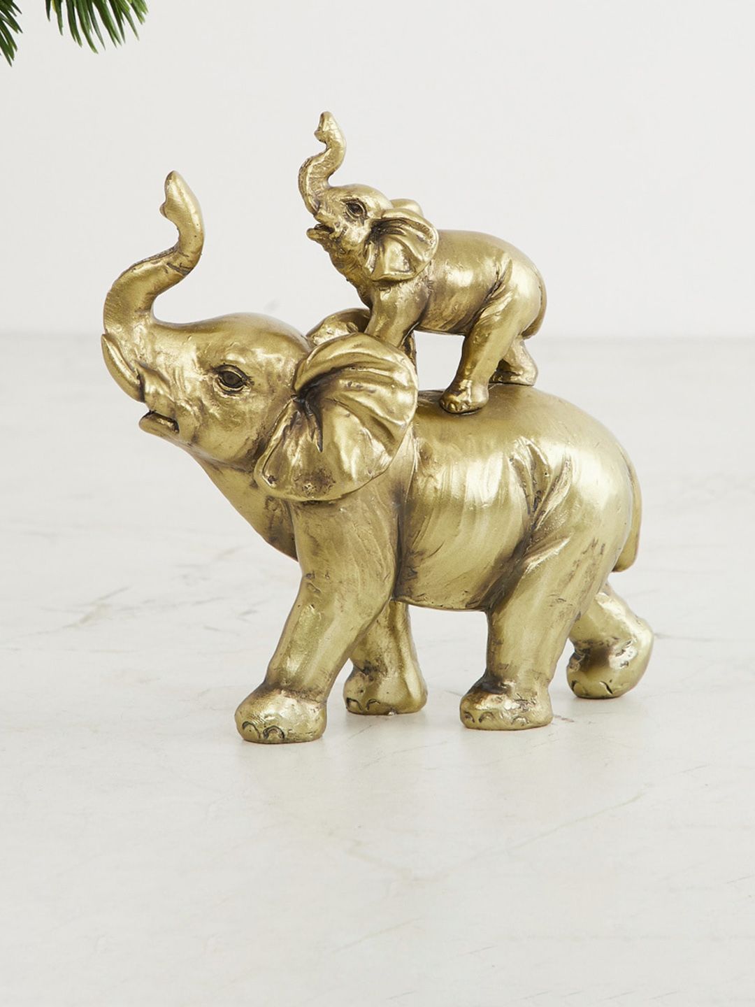 Home Centre Gold-Toned Solid Polyresin Baby Elephant With Mother Figurine Price in India