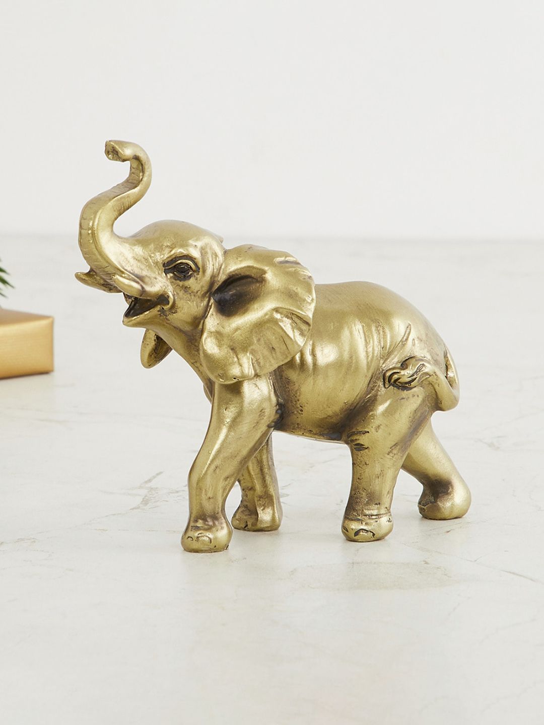 Home Centre Gold-Toned Solid Polyresin Elephant Figurine Showpiece Price in India