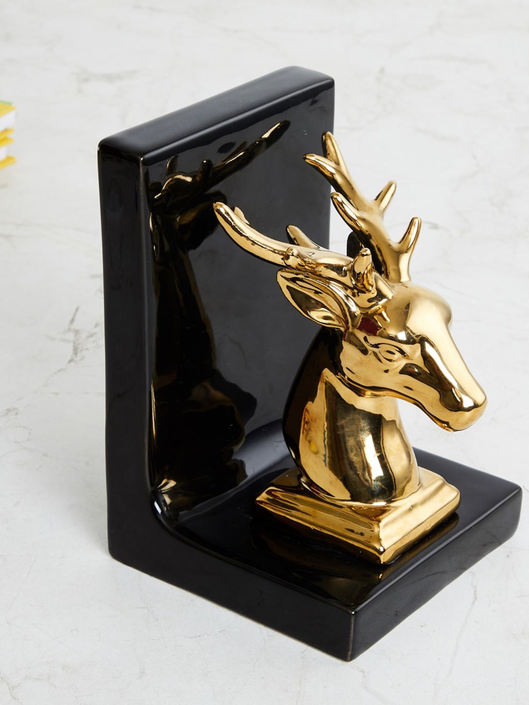 Home Centre Black and Gold Solid Ceramic Reindeer Figurine Showpieces Price in India