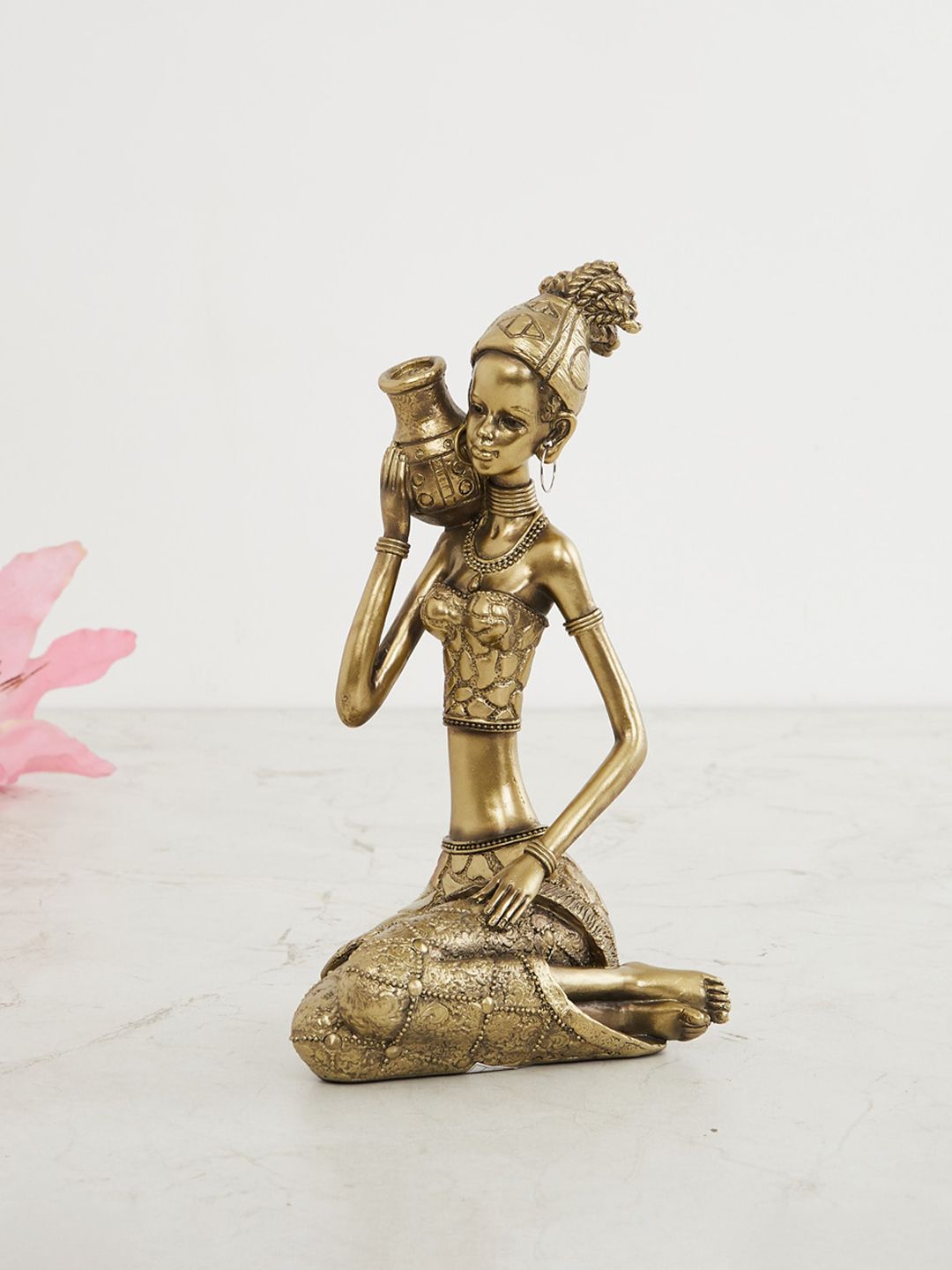 Home Centre Gold Textured Polyresin African With Pot On Shoulder Figurine Showpiece Price in India