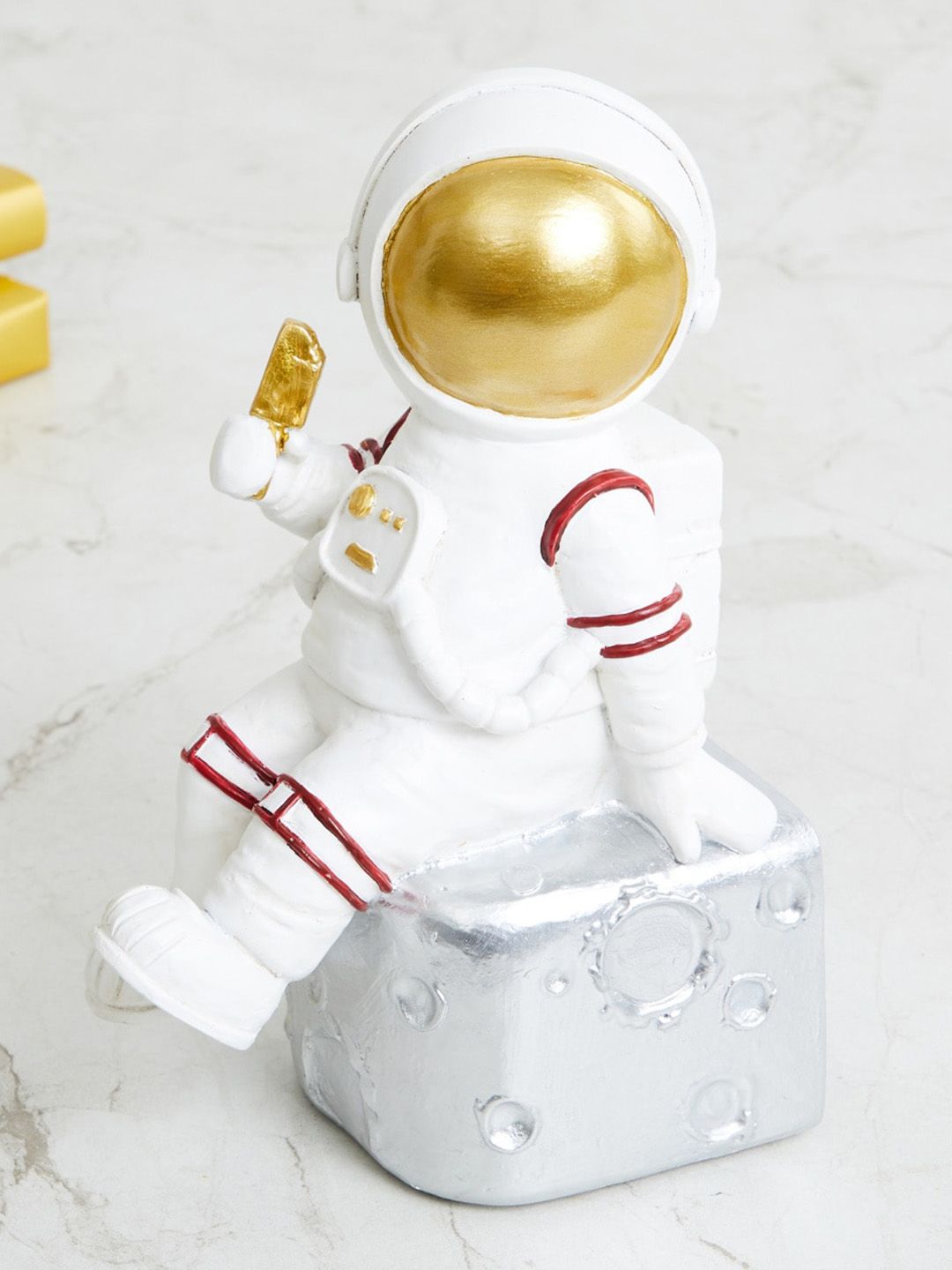 Home Centre Souvenir Polyresin Astronaut Sitting Posture Figurine Price in India