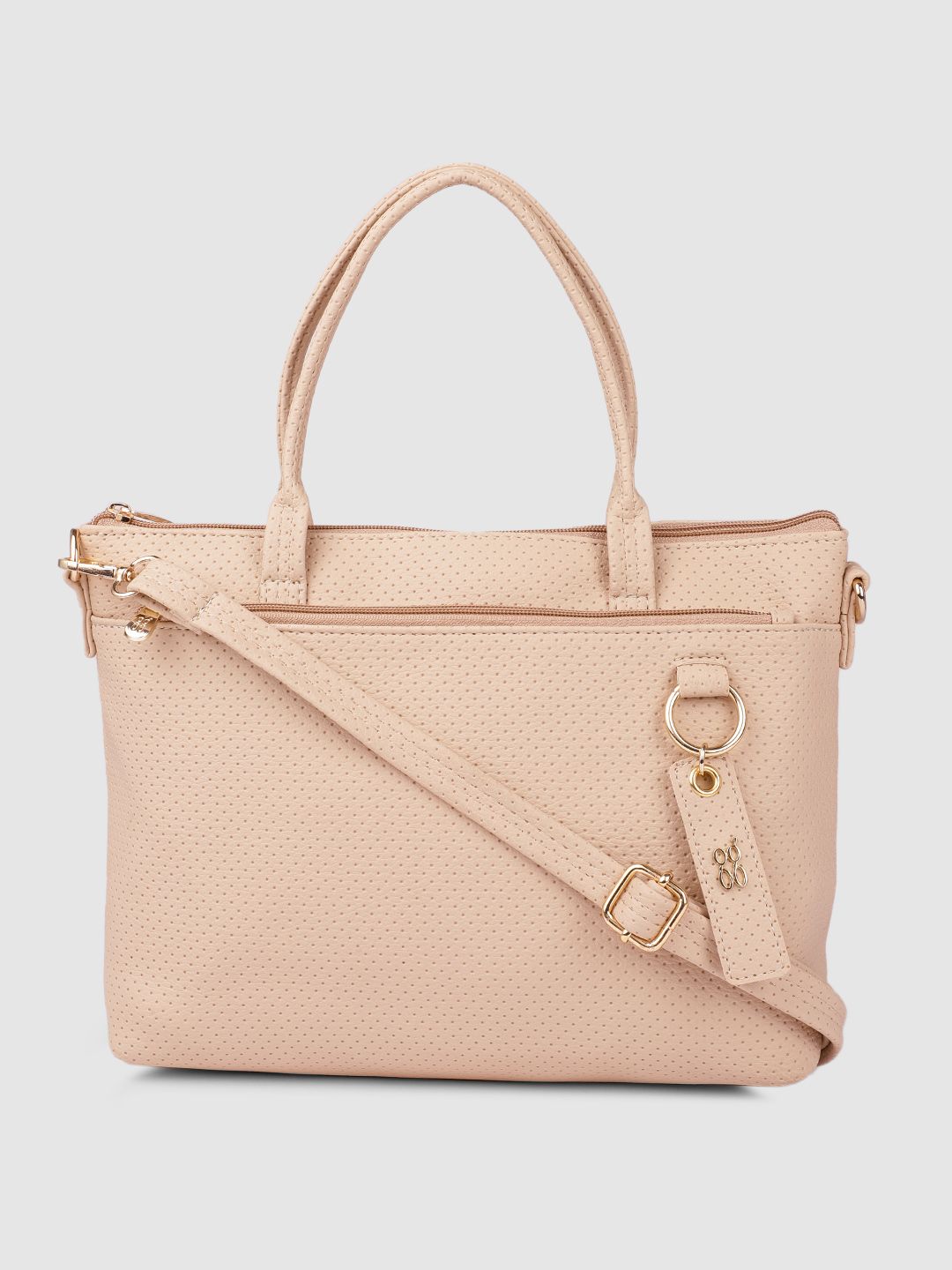 Baggit Beige Textured Handheld Bag Price in India