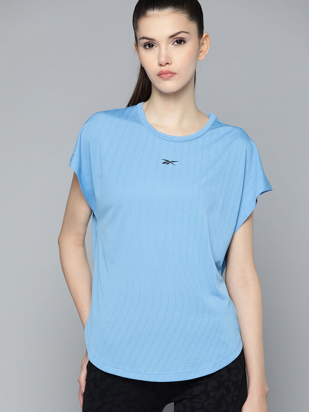 Reebok Women Blue Printed Extended Sleeves UBF Perforated T-shirt Price in India