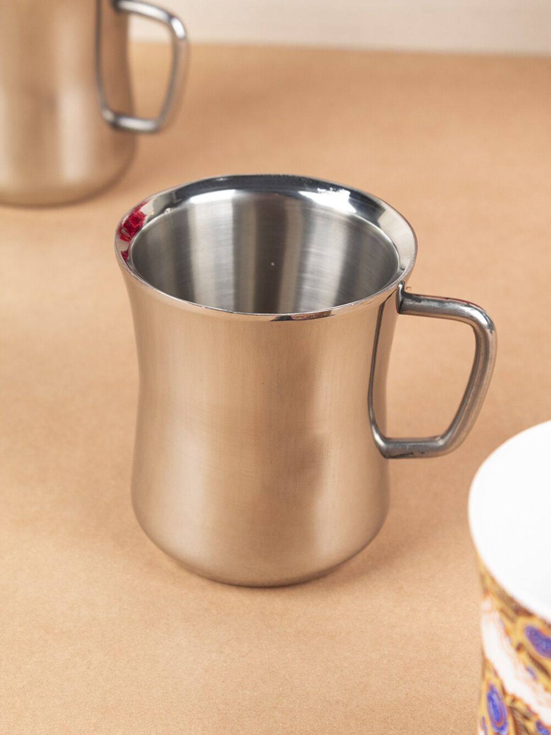 MARKET99 Set of 2 Silver-Toned & Copper-Toned Solid Stainless Steel Glossy Mugs Price in India