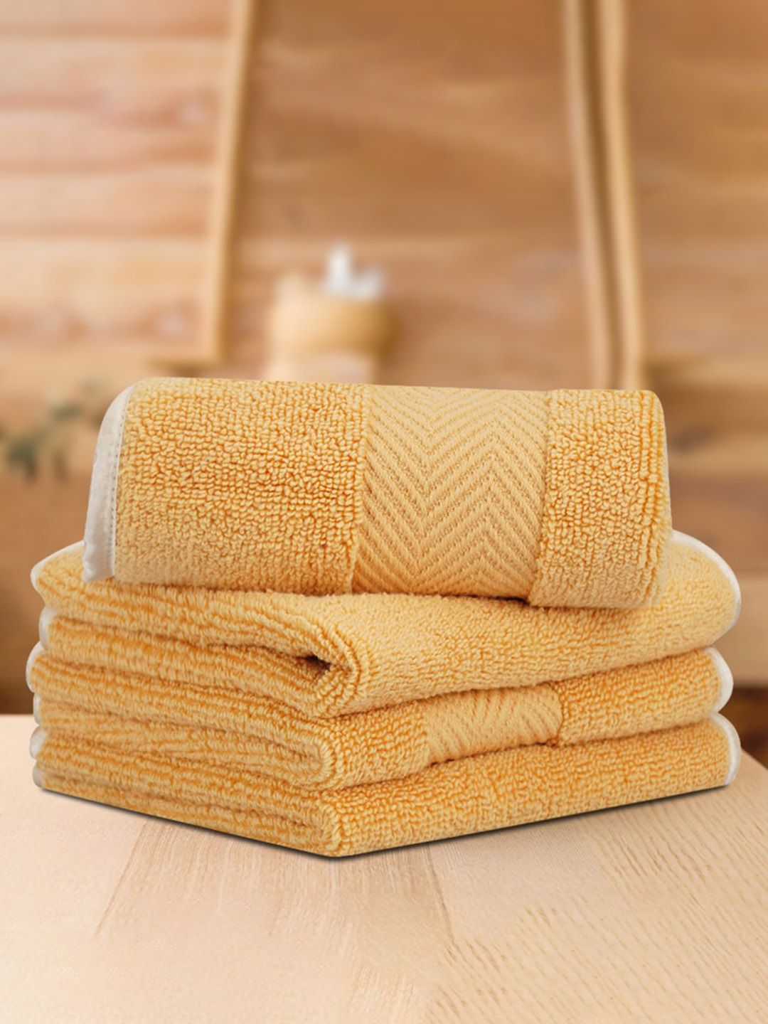 LUSH & BEYOND Set Of 4 Yellow Solid 600 GSM Pure Cotton Face Towels Price in India