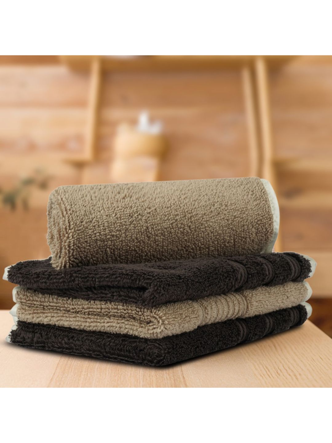 LUSH & BEYOND Set Of 4 Beige & Black Solid 500 GSM Pure Cotton Face Towels Price in India