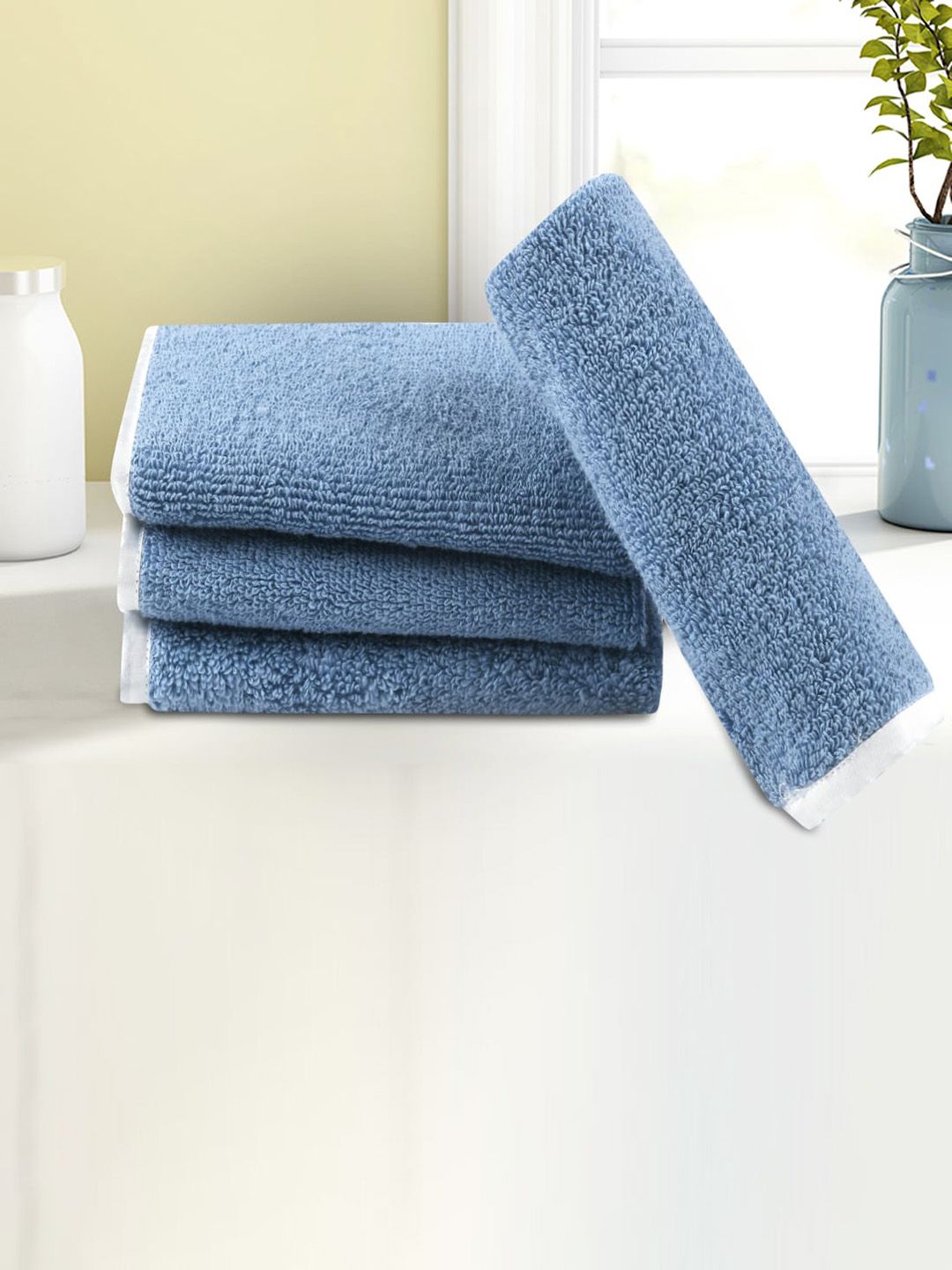 LUSH & BEYOND Set Of 4 Blue Solid 500 GSM Pure Cotton Face Towels Price in India